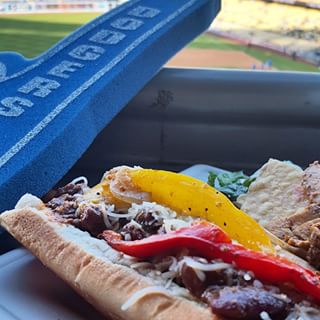Dodger dog topped with chilli and @CaciqueInc cheese and pepper.…